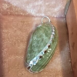 Elegant Green Pendant with Silver Accents